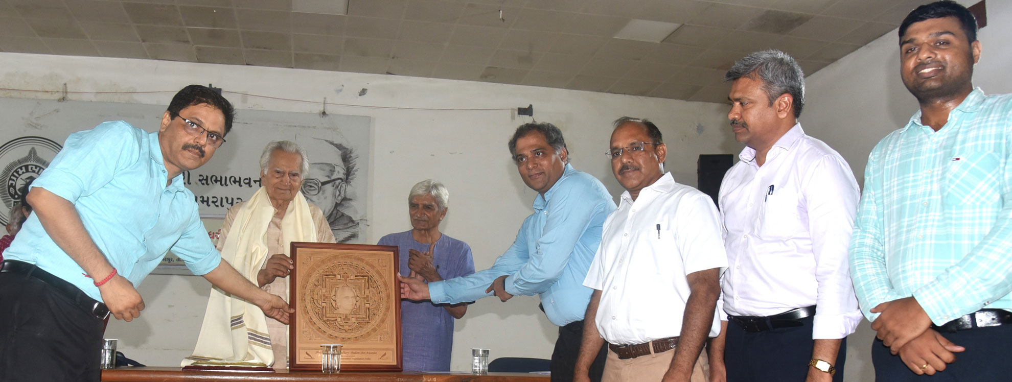 NIF staff Honoring Shri Raghuveer Chaudhary-Managing Trustee, Grambharti campus, Amrapur for his Padma Shri Award