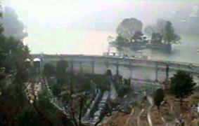 109 Year Old Check Dam with Water Discharge through the Dam Wall Chamber - Photo