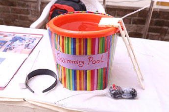 Modified life saving device for swimming learners - Photo