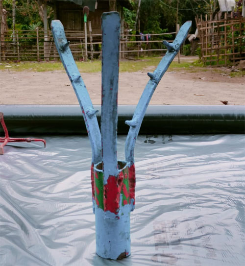 Coconut Harvesting Tool and Eri Cocoon Opener - Photo