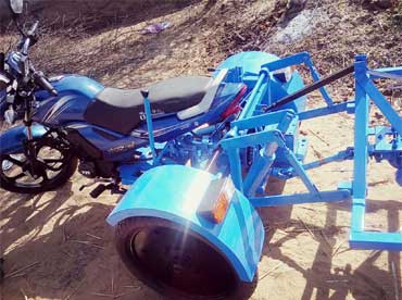 Onion Harvester and Motorcycle Operated Salt Turning Device  - Photo