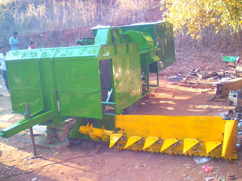 Image of Tractor mounted combine harvester with straw collector