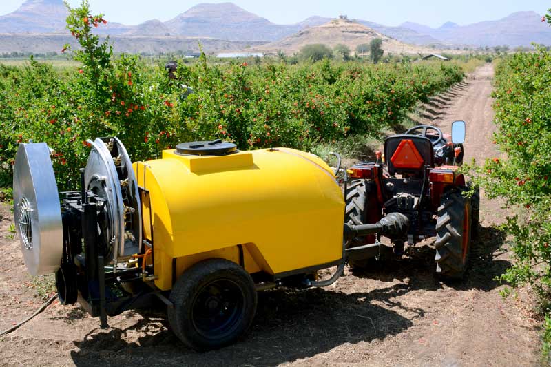 Image of Tractor operated blowing orchard sprayer