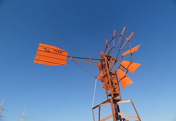 Windmill powered water pump modified stove hybrid tractor and others - Photo