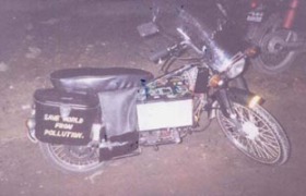Battery operated pollution free Motor Cycle - Photo