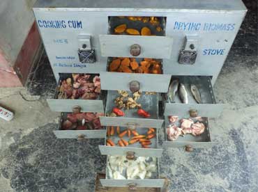 Cooking cum drying stove - Photo
