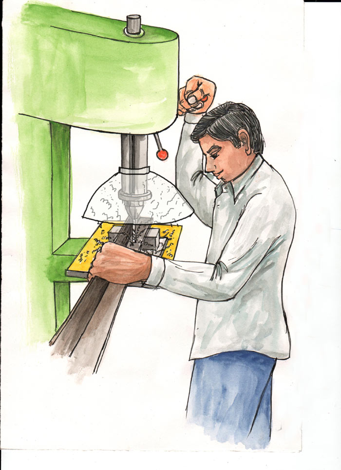 Image of Attachment on drill machine to gather metal chips
